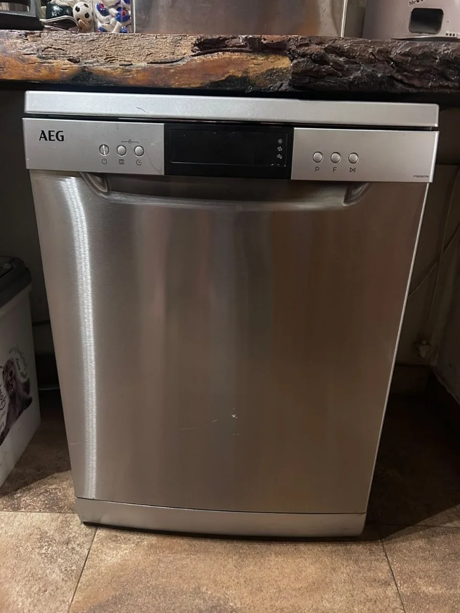 The stainless-steel AEG dishwasher under the kitchen counter.